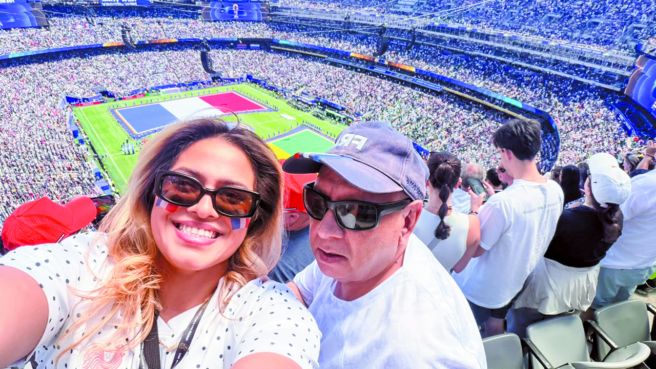 Razack (right) and his daughter Zaynah attended the France vs Senegal game in New Jersey.