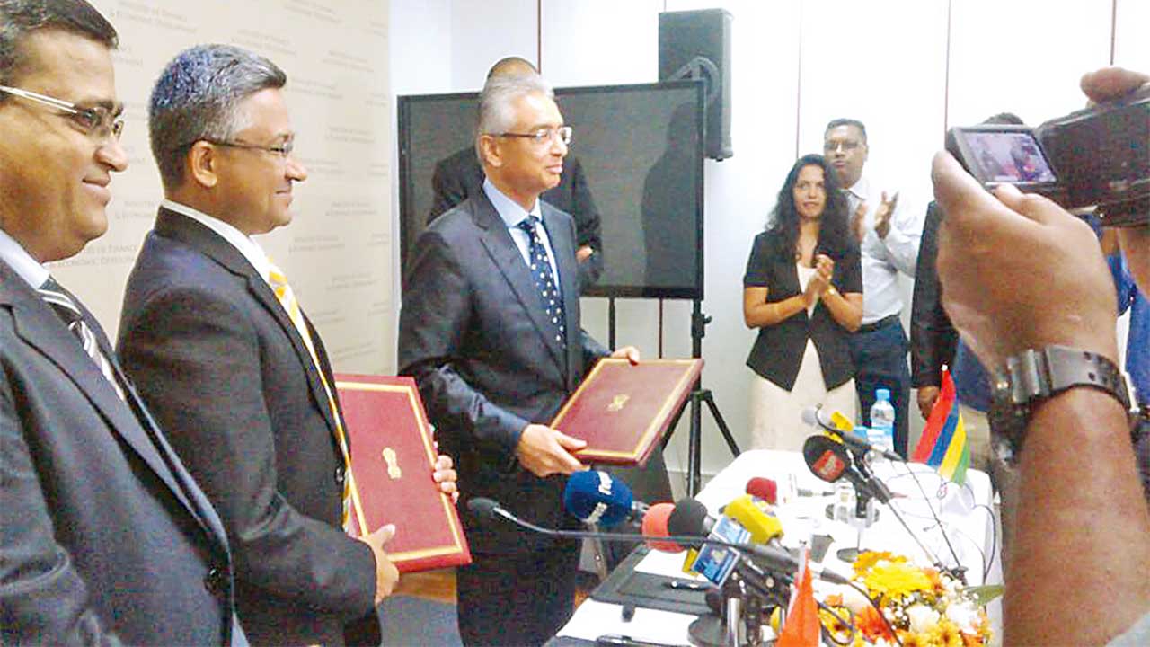 Finance Minister Pravind Jugnauth and Abhay  Thakur