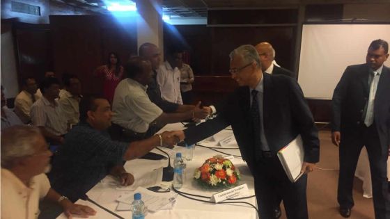 Compensation salariale : réunion tripartite à huis clos