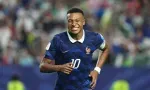 Mondial: sous la pluie, Mbappé répond à Messi