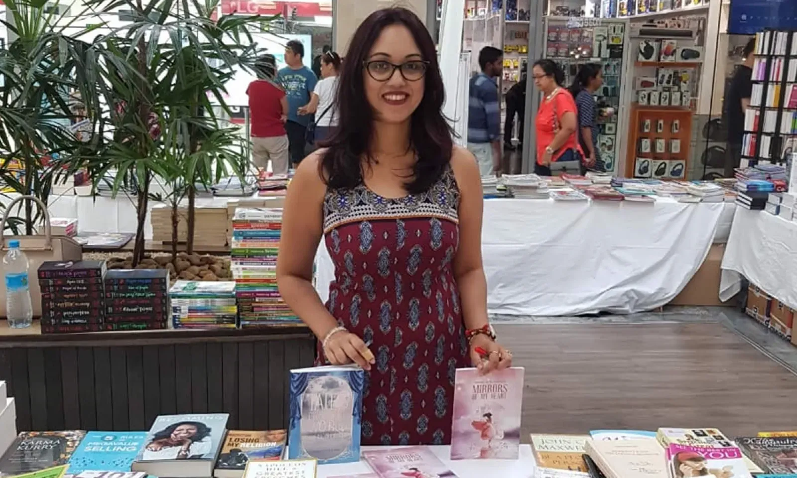 Anousheka Gangabissoon selling her works at a book  exhibition hosted by the Editions de l’Océan Indien.