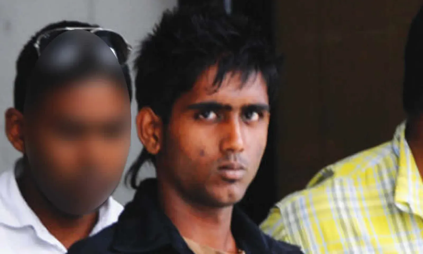 Kunal Prayagsing (au centre).