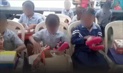 Don de chaussures à l’école André Bazerque