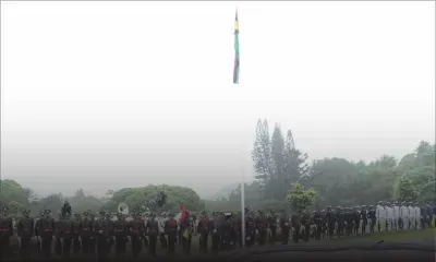 Fête nationale 2020 : une cérémonie de lever du drapeau sous la pluie