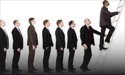 Promotion at work : Seniority or Merit?