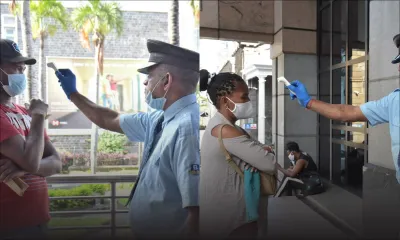 Reprise graduelle : les clients soumis à une prise de température devant la SBM