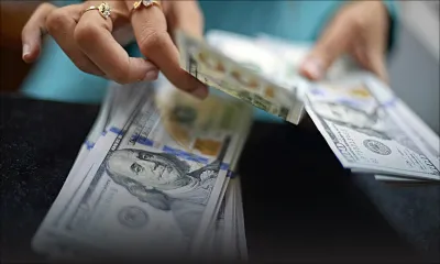 Devises: La roupie garde son calme face au billet vert