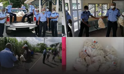 Distribution de pains aux familles dans le besoin par la police de Grand-Baie