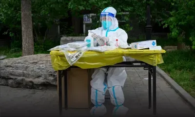 Covid : nouvelles restrictions à Pékin, aux airs de ville fantôme