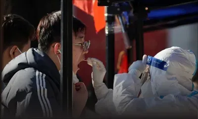 Covid-19: la Chine confine une ville de 13 millions d'habitants