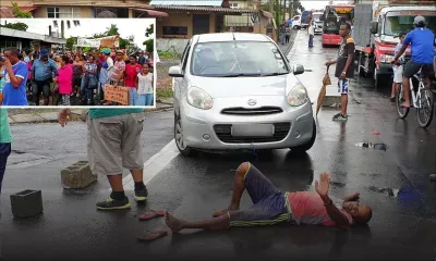 Coupures d’eau – des habitants de Résidence Atlee dans la rue 