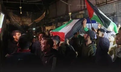 Des milliers de Palestiniens exultent à travers la bande de Gaza à l'annonce d'une trêve  