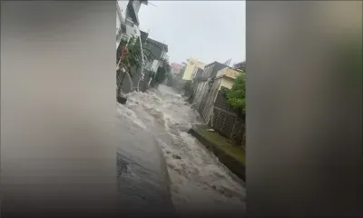Avis de fortes pluies : torrent d'eau boueuse à la rue Nyon, Port-Louis