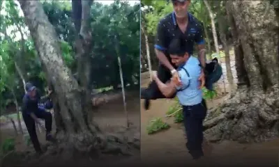 Mon-Goût : prisonnier des eaux, un homme secouru par des policiers 