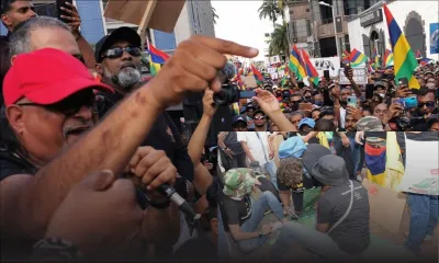 Des membres de Rezistans ek Alternativ, présents à la marche citoyenne