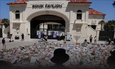 Attentat de Sydney : l'assaillant inculpé de terrorisme, inhumation des victimes