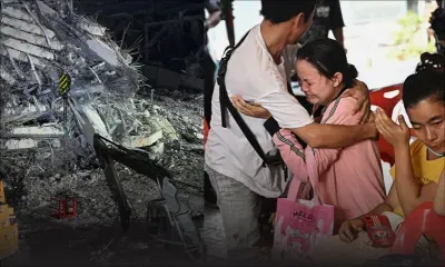Sirènes et sanglots sur les ruines de Mandalay lors de l'hommage aux victimes du séisme