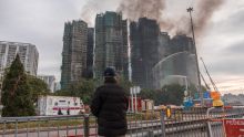  Incendie de Hong Kong : 146 morts, un activiste réclamant justice présumé arrêté