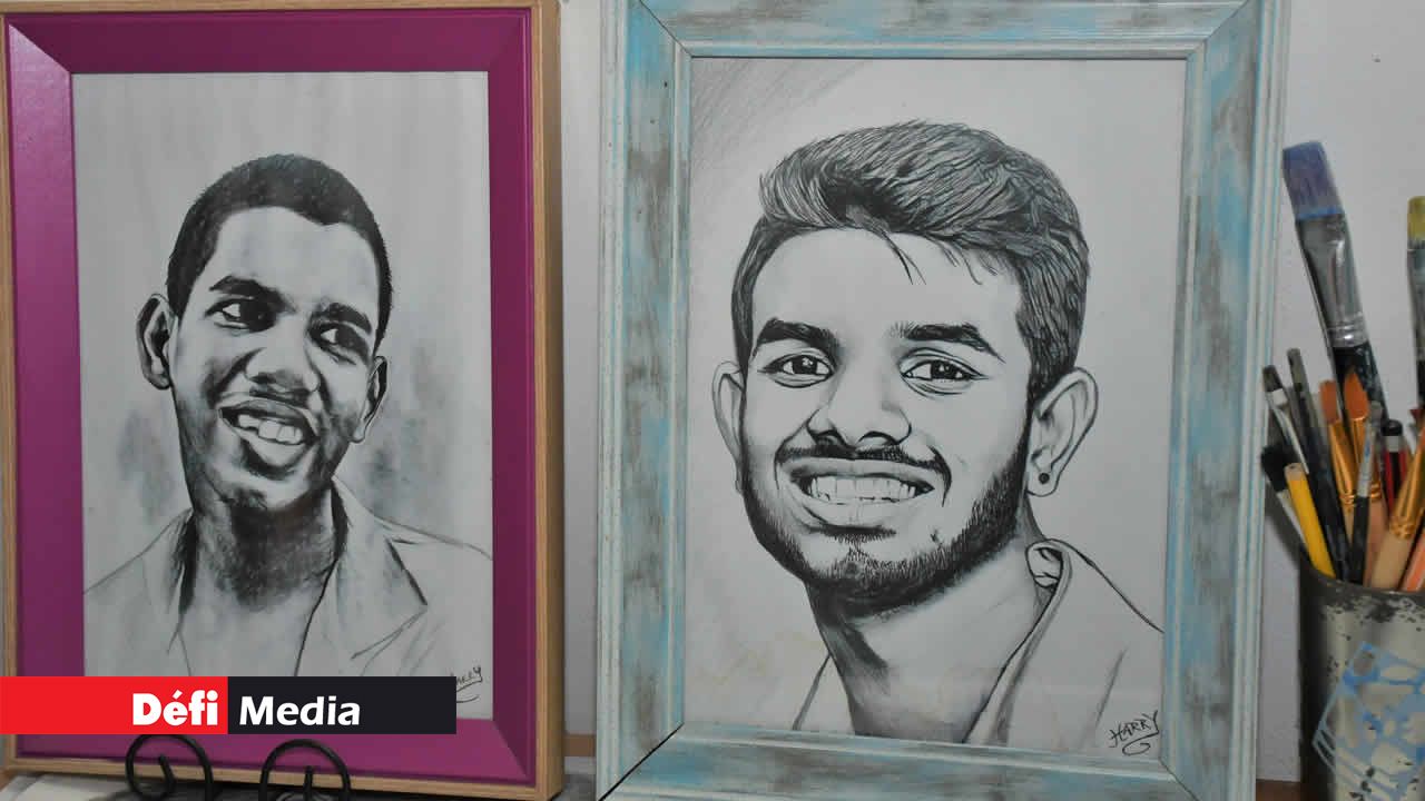 Les portraits de ses deux fils dans son atelier.