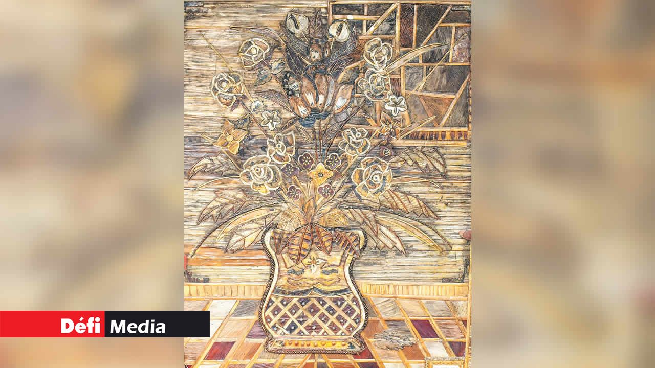 Le tableau d’un vase à fleurs.