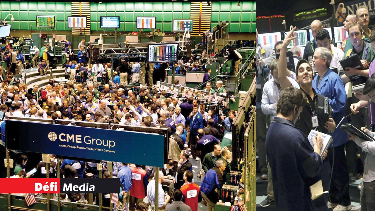 Commodity traders have been taken aback with the continued slide of oil prices.
Here the NYMEX trading floor.