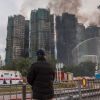  Incendie de Hong Kong : 146 morts, un activiste réclamant justice présumé arrêté